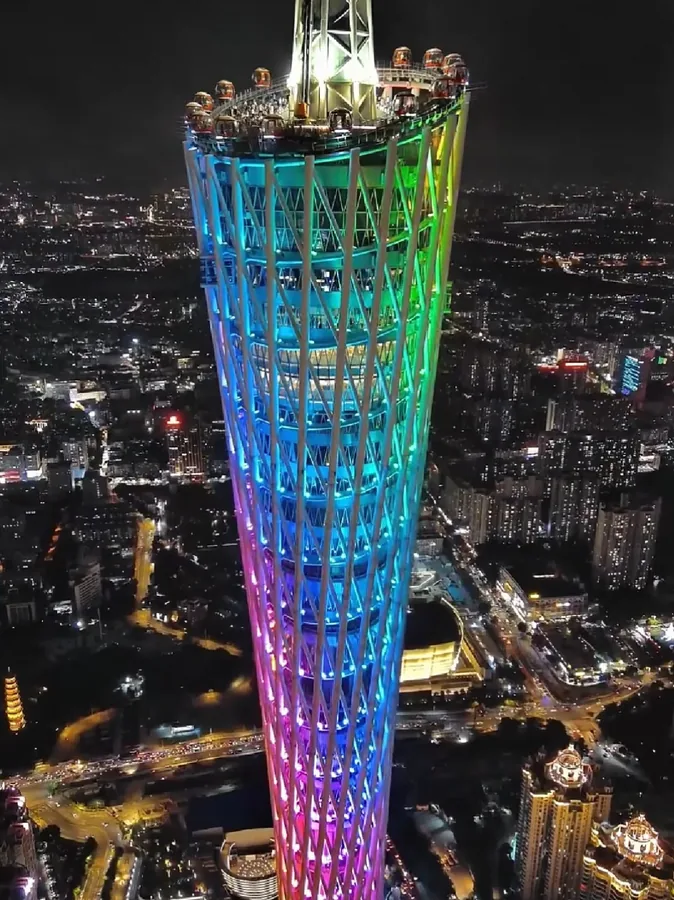 Canton Tower illuminated over the Pearl River in Guangzhou