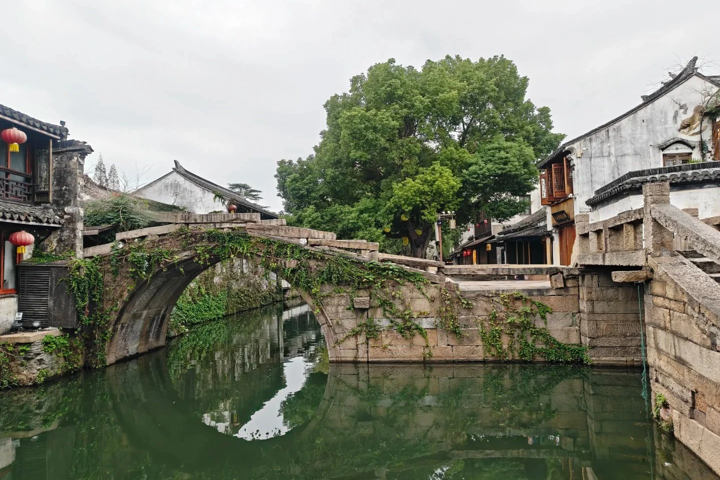 Zhouzhuang water town near Suzhou — canal village with stone bridges and wooden houses