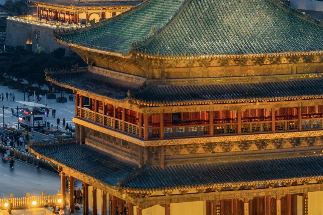 Xi'an Bell Tower at the center of the walled city, lit up at dusk